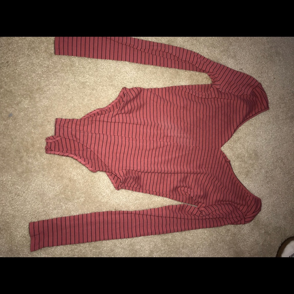 pink bodysuit with black stripes